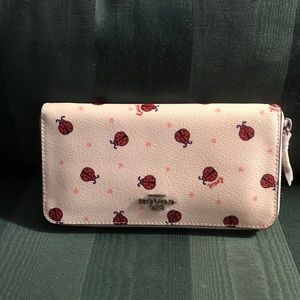Difficult to find Coach Ladybug wallet